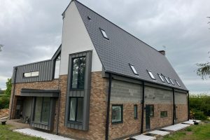 Large property with several windows which have aluminium frames